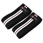 Rewon Gear black and white knee sleeves for weightlifting and MMA protection, ideal for fitness and boxing training support.